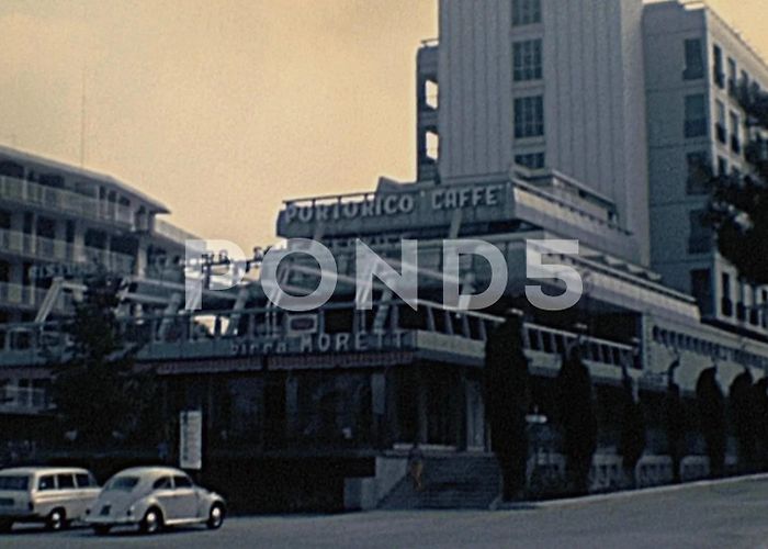 Porto Lignano Lignano Sabbiadoro, Italy - 1970: traffi... | Stock Video | Pond5 photo