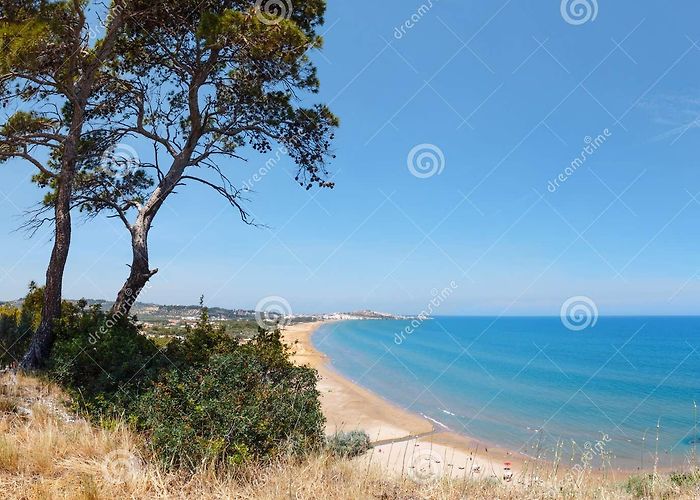 Portonuovo beach Summer Lido Di Portonuovo Beach, Italy Stock Image - Image of blue ... photo