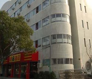 Super 8 Ningbo Gang Long Hotel Exterior photo